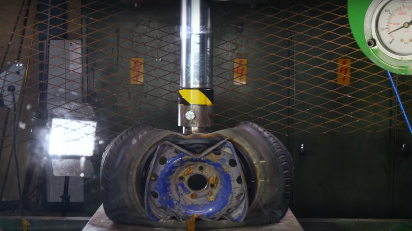 Watching Steel and Alloy Car Wheels Being Crushed by Hydraulic Press Is Weirdly Relaxing