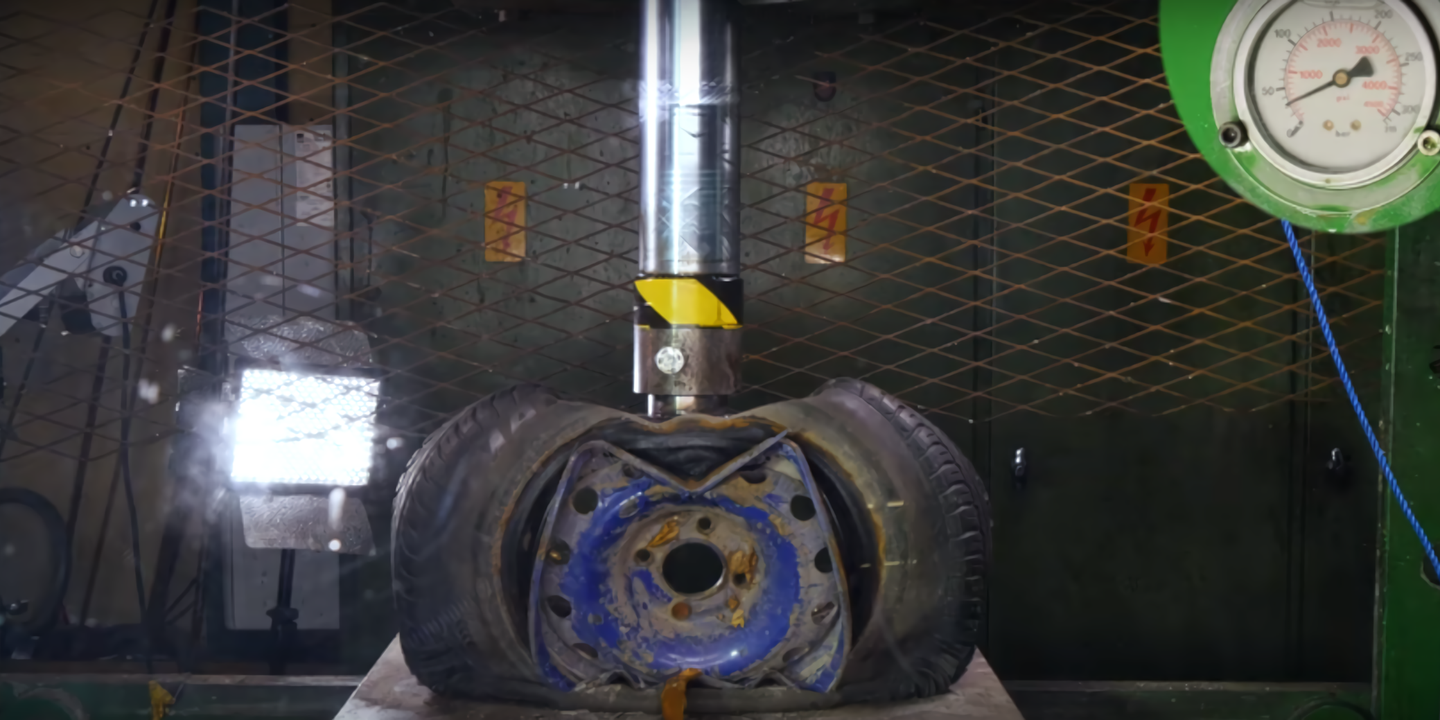 Watching Steel and Alloy Car Wheels Being Crushed by Hydraulic Press Is Weirdly Relaxing