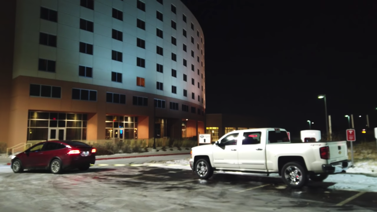 Tesla Model X Owner &#8216;De-ICEs&#8217; Supercharger by Towing Away Parked Chevrolet Silverado
