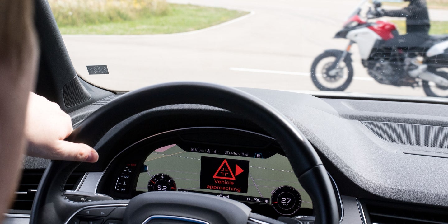 Audi, Ford, and Ducati Demonstrate Car-to-Bike Communication Tech at CES 2019