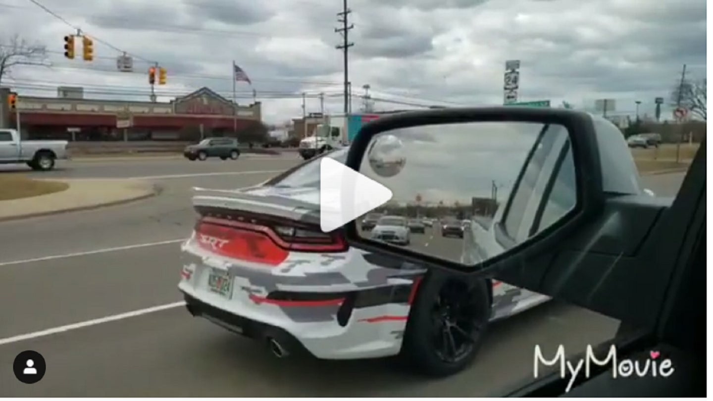 Could This Be the Upcoming Dodge Charger Hellcat Widebody Cruising Around Detroit?