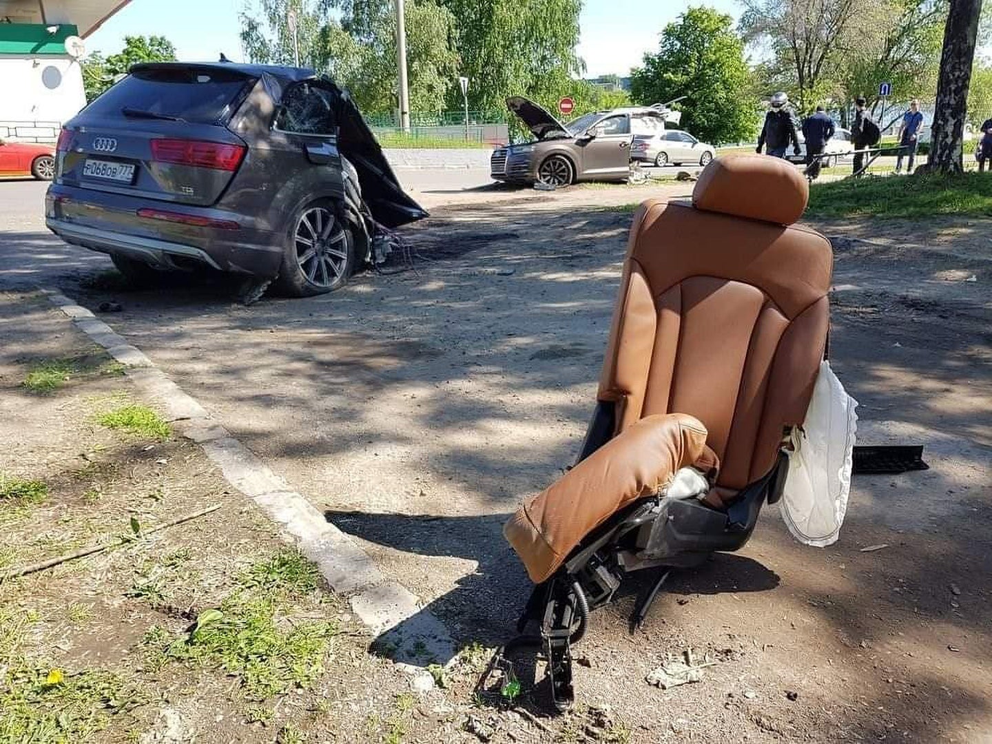 Audi Q7 SUV Split Directly in Half After High-Speed Collision With Utility Pole