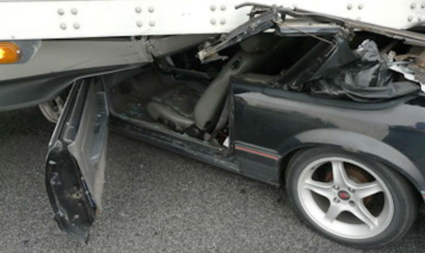 Semi Truck Driver Drags Crushed Ford Mustang for Half-Mile Before Realizing Something’s Wrong