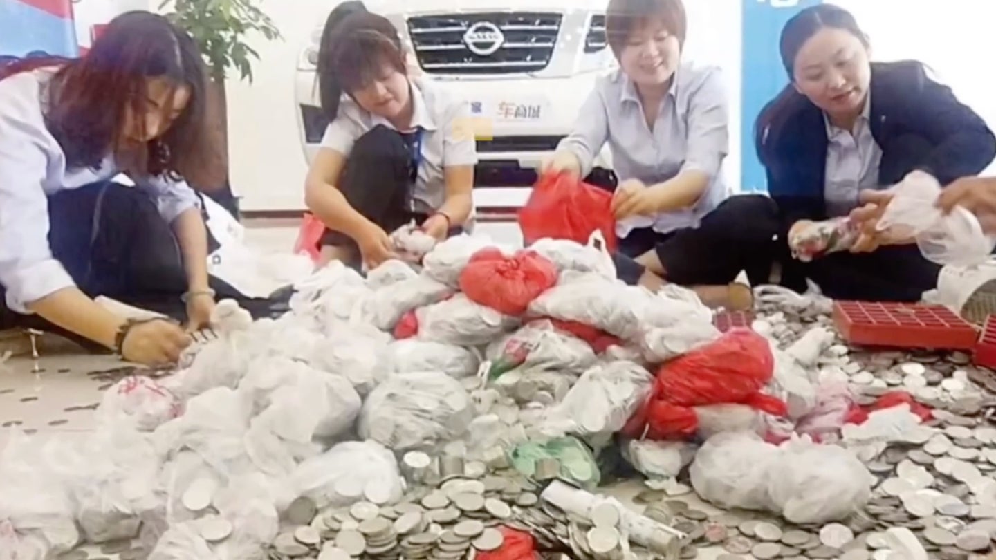 Man Drops 66 Bags Full of Coins Worth $18,800 for a New Car