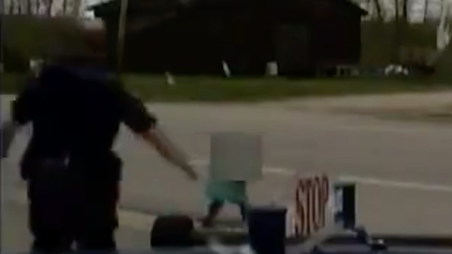 Watch a Michigan Police Sergeant Save a Toddler from Being Hit by a Dump Truck
