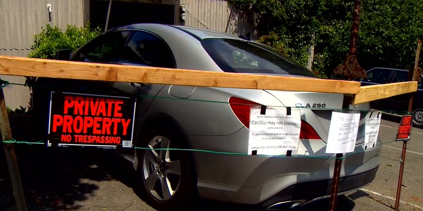Man Builds Barricade Around Car-Sharing Vehicle Parked on His Property, Demands Payment