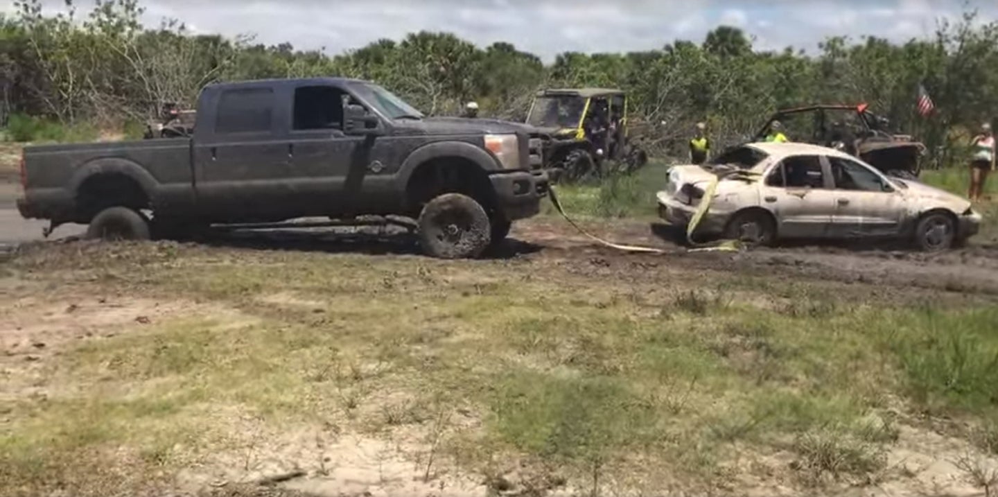 Watch a Stuck Ford F-250 Pickup Truck Get Rescued by Beat Up Chevrolet Cavalier