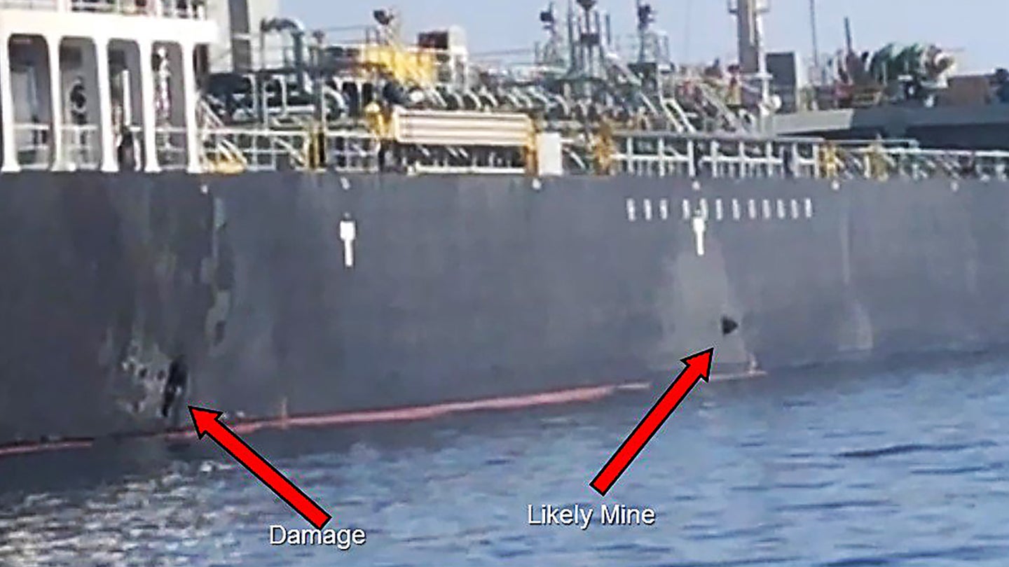 U.S. Says Video Shows Iranian Forces Removing Dud Mine From Damaged Tanker (Updated)