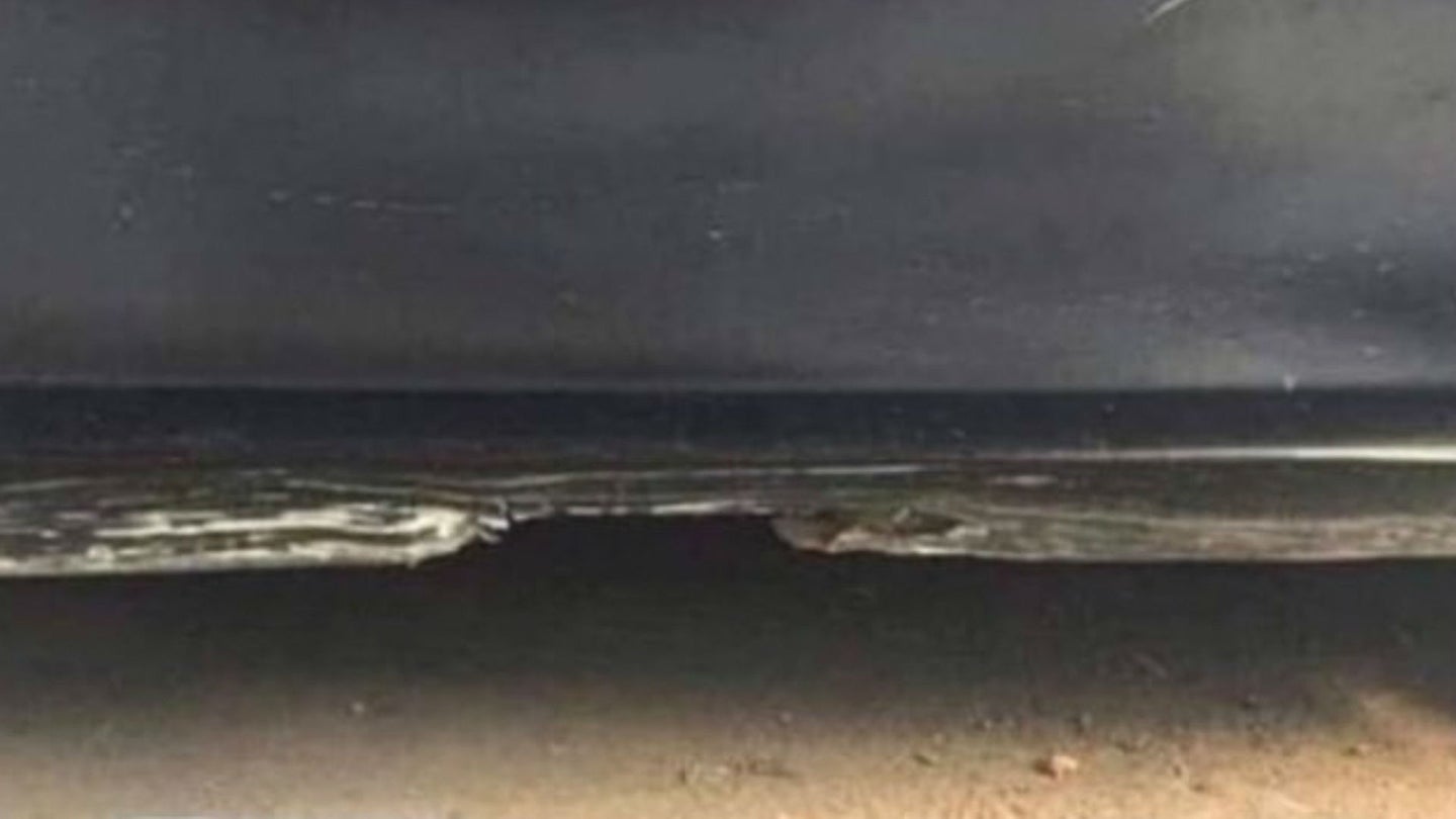 People Are Losing Their Minds Over Beach Illusion That&#8217;s Actually a Beat-Up Car Door