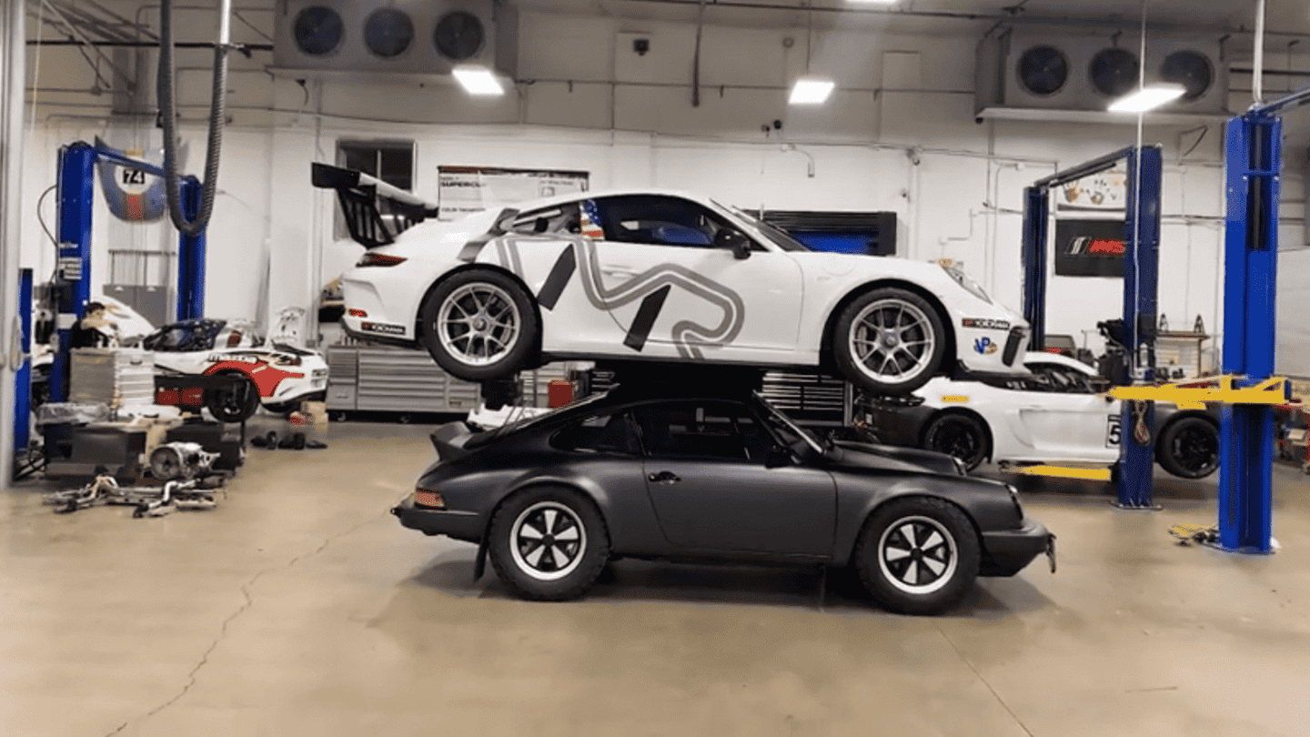 This Porsche 911 Safari Build Is Strong Enough to Hold an Entire GT3 Cup Race Car on Its Roof