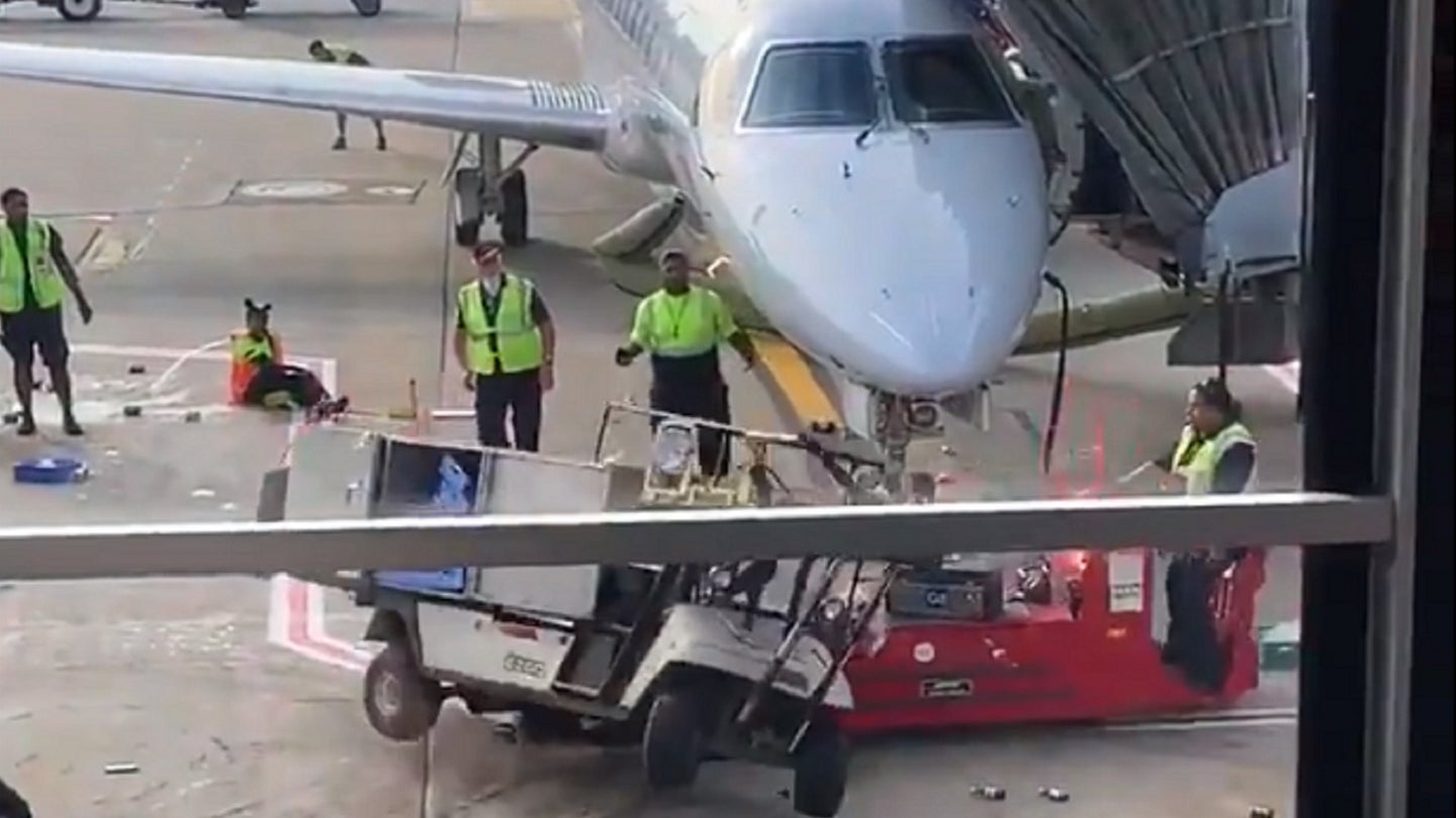 Man Saves Plane By Spearing Out-of-Control Utility Cart With Airport Vehicle
