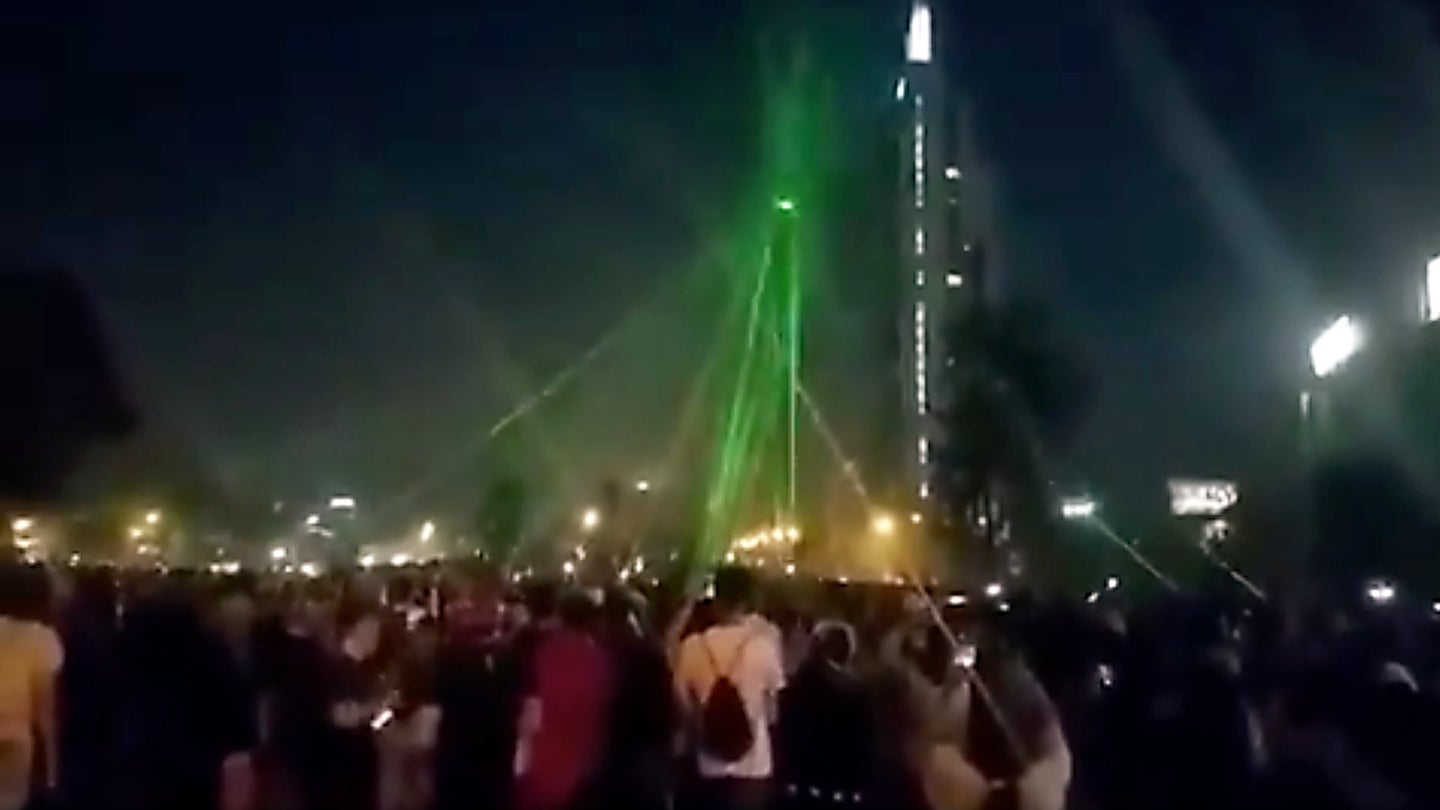 Chilean Protestors Down Drone By Dazzling It With Dozens Of Laser Pointers (Updated)