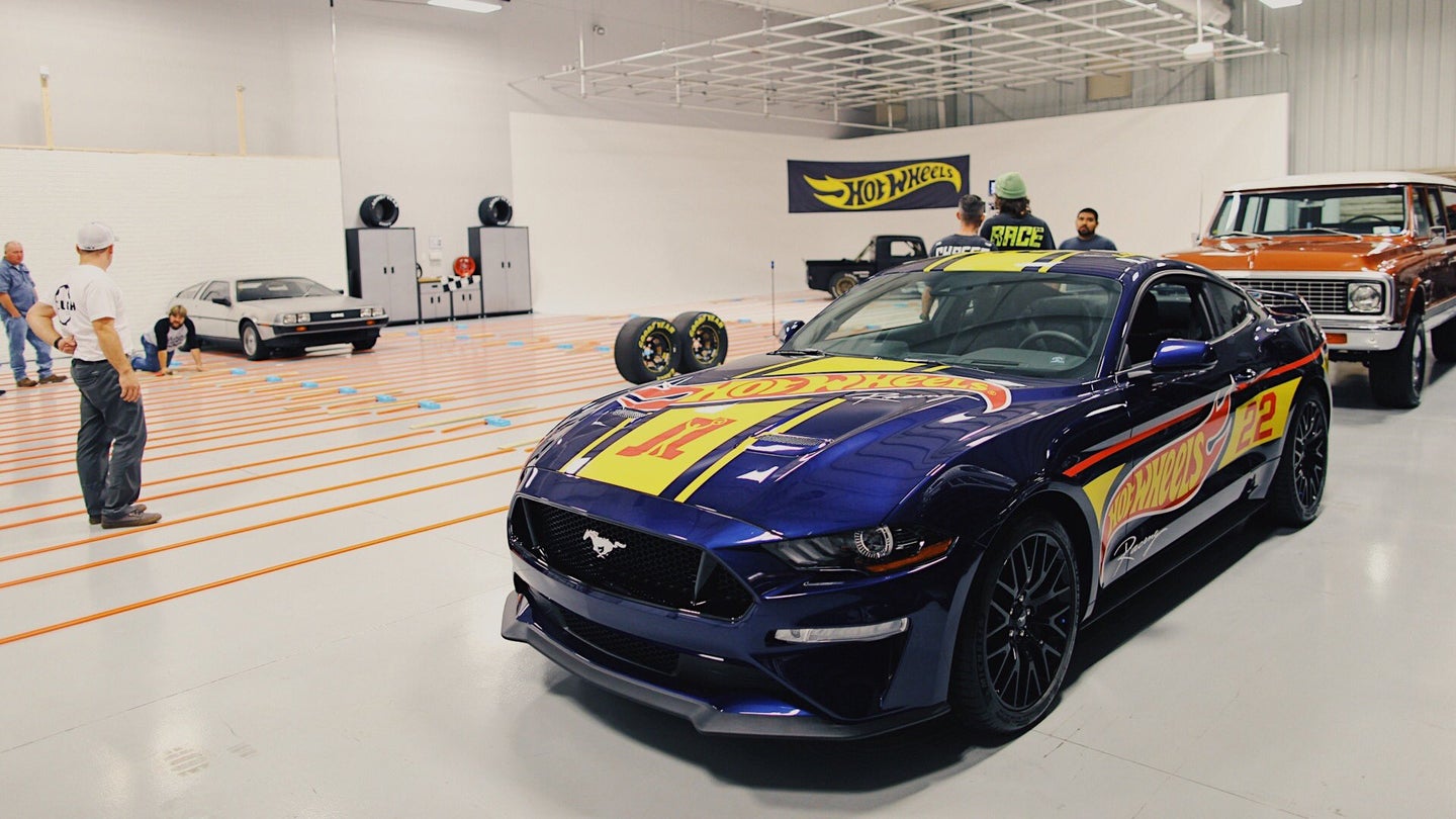 NASCAR Champ Joey Logano Builds World&#8217;s Longest Hot Wheels Track in His Garage