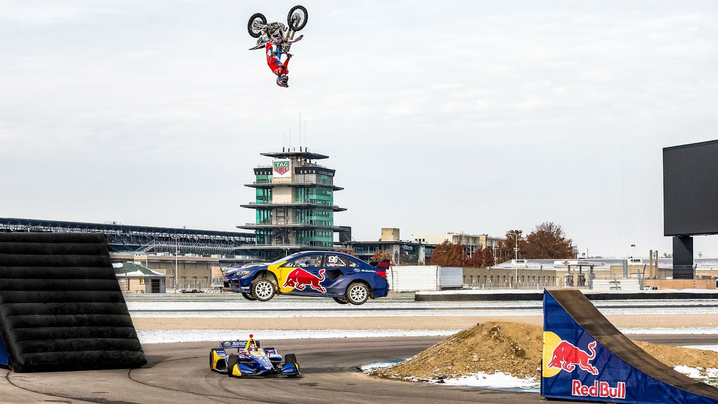 An Indy Car, Rally Car, and FMX Dirtbike Drive Into an Empty Indy Motor Speedway…