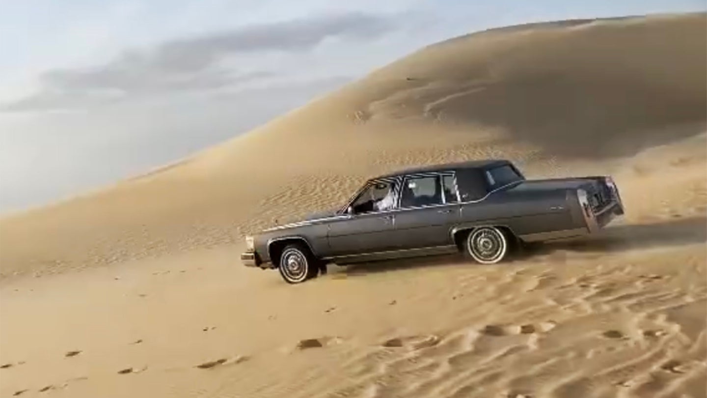 Classic Cadillac Brougham Playing in the Dunes Is Here to Shame Your Lifted SUV