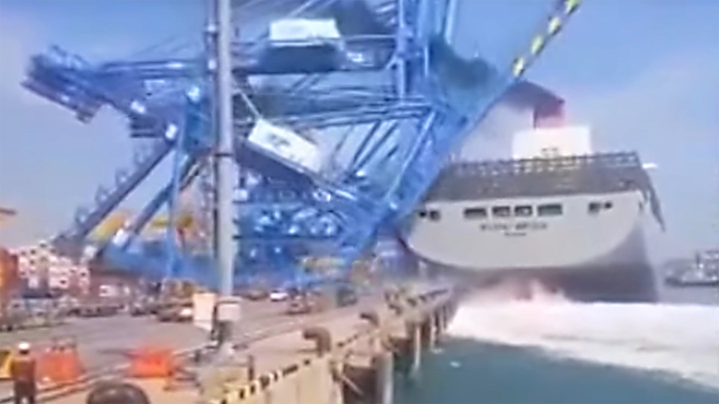 This Out Of Control Cargo Ship Creaming A Huge Dock Crane Is Like Something Out Of Godzilla
