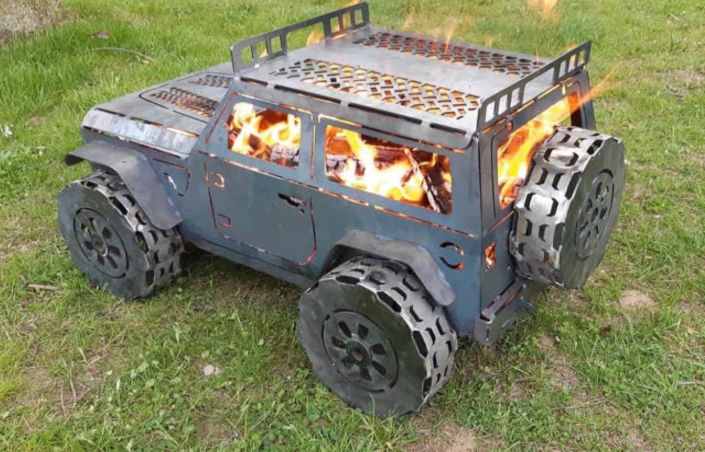 These Laser-Cut Jeep Wrangler Fire Pits Double as an Off-Roader&#8217;s Favorite Campside Grill