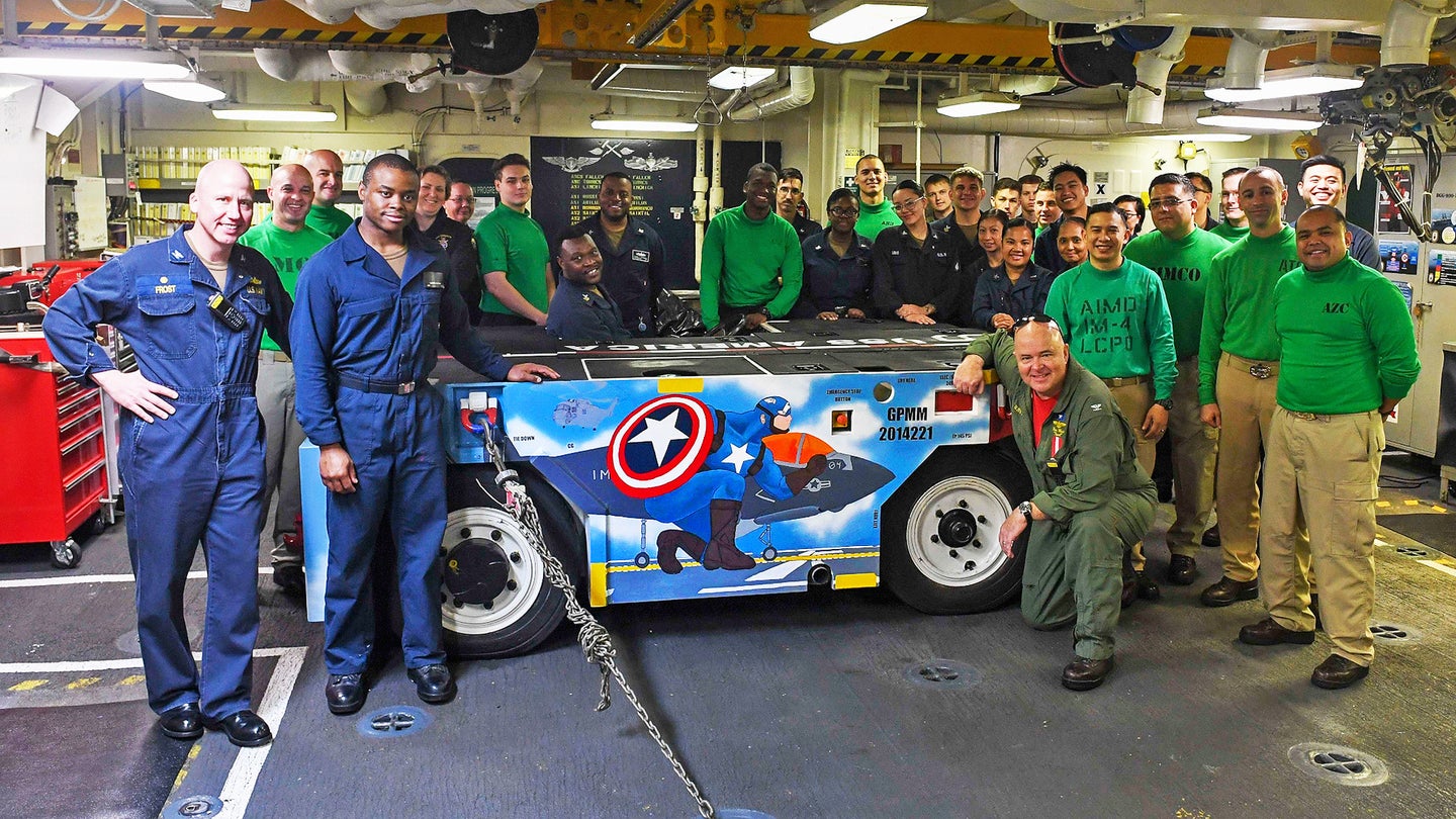 USS America Keeps Captain America Theme Going With Custom Painted Tractor