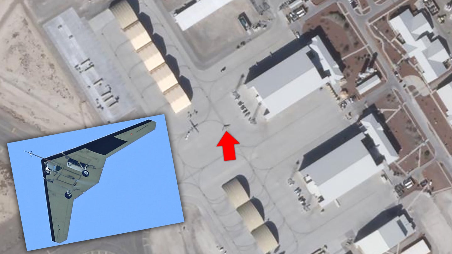 Satellite Image Of RQ-170 Taxiing By MQ-9 Gives Best Size Estimate Yet Of Stealth Drone