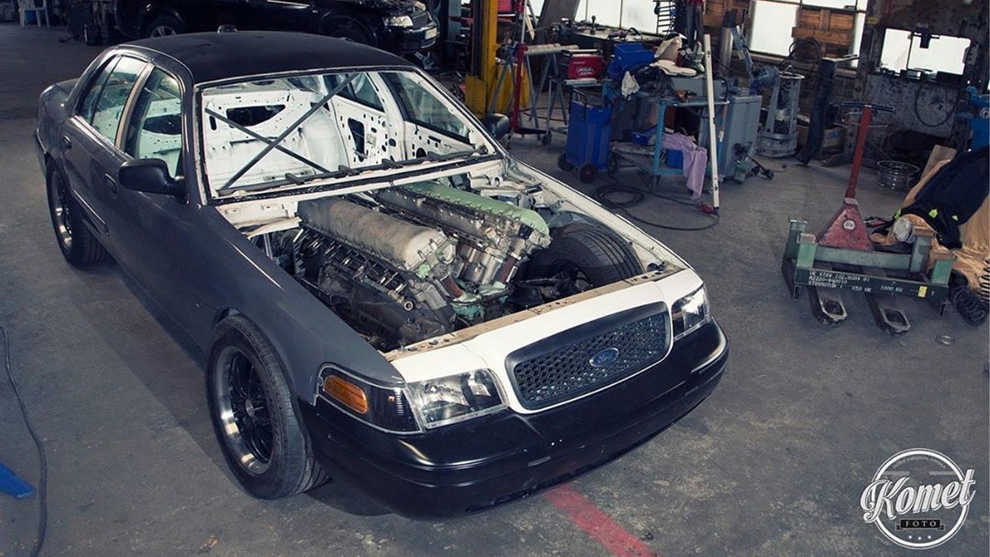 This Madman Is Swapping a 27-Liter V12 From a Tank Into a Crown Victoria