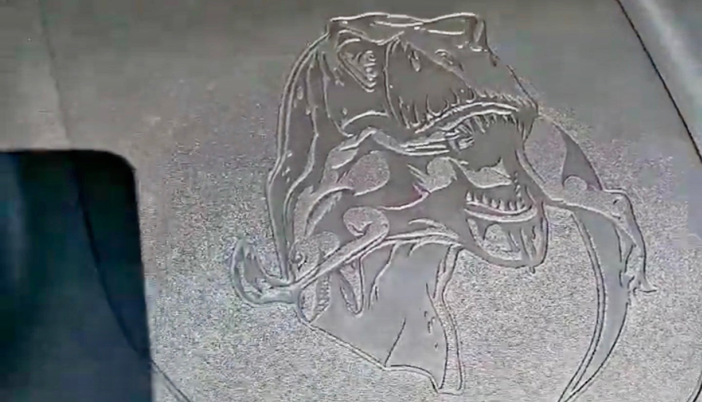 Hidden 2021 Ram 1500 TRX Easter Egg Shows T-Rex Chomping on a Raptor