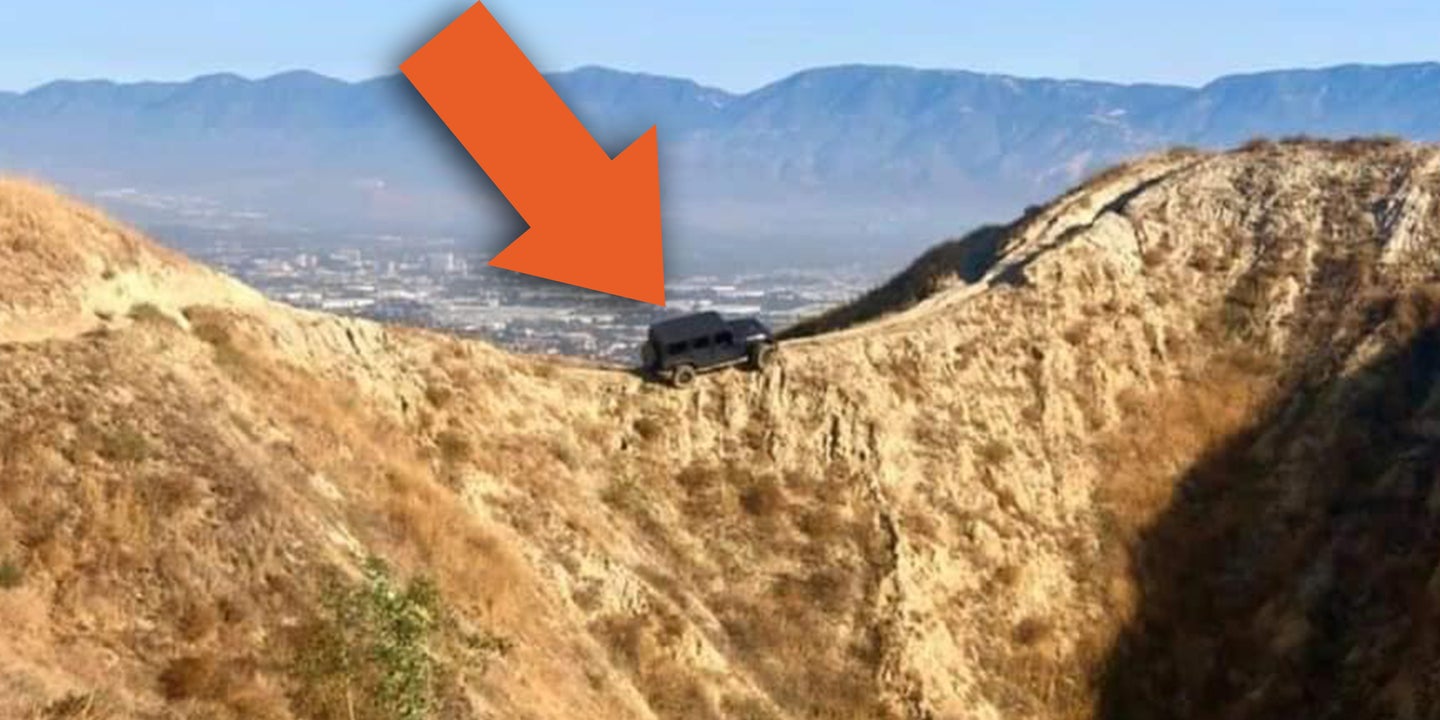 There’s a Jeep Wrangler Dangling Off a Cliff in California After Some Fool Drove Up a Bike Trail