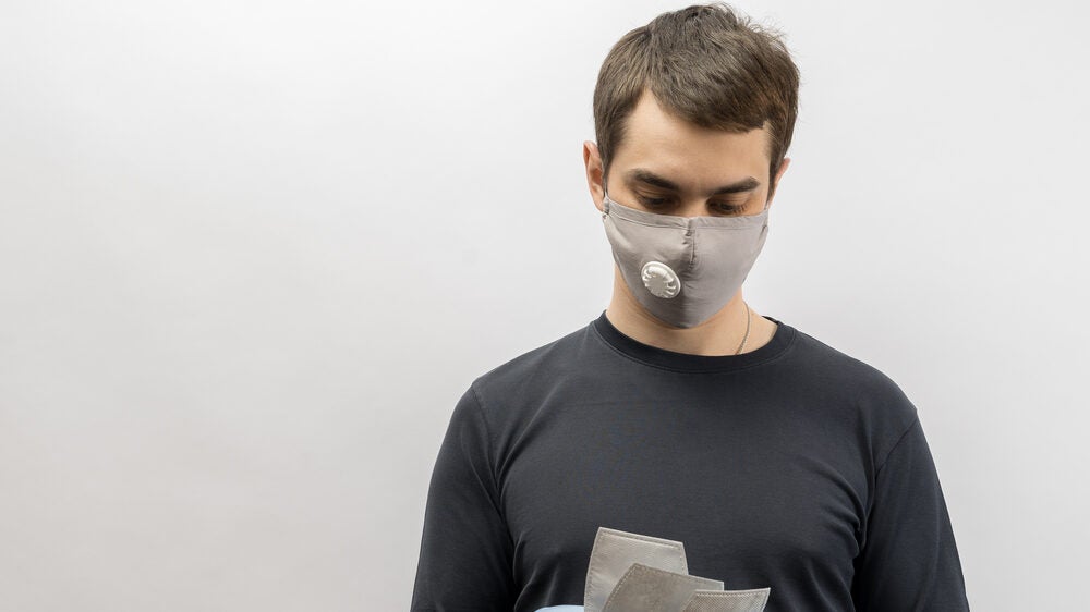 Man Wearing Unisex ATV Dust Mask