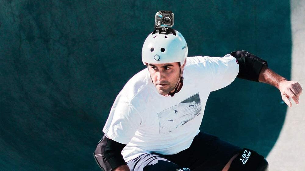Action Camera On Man's Helmet