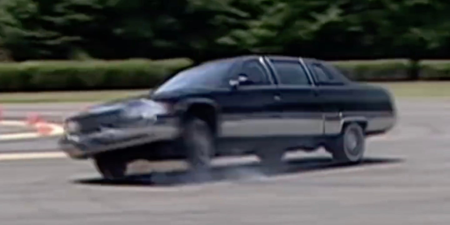 Watch a Secret Service Agent Nail a Three-Wheel J-Turn in a Cadillac Fleetwood Limo
