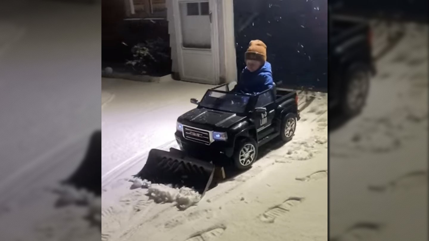 Resourceful Parents Add Makeshift Snow Plow to Son’s Ride-On Truck So He Can Help Shovel