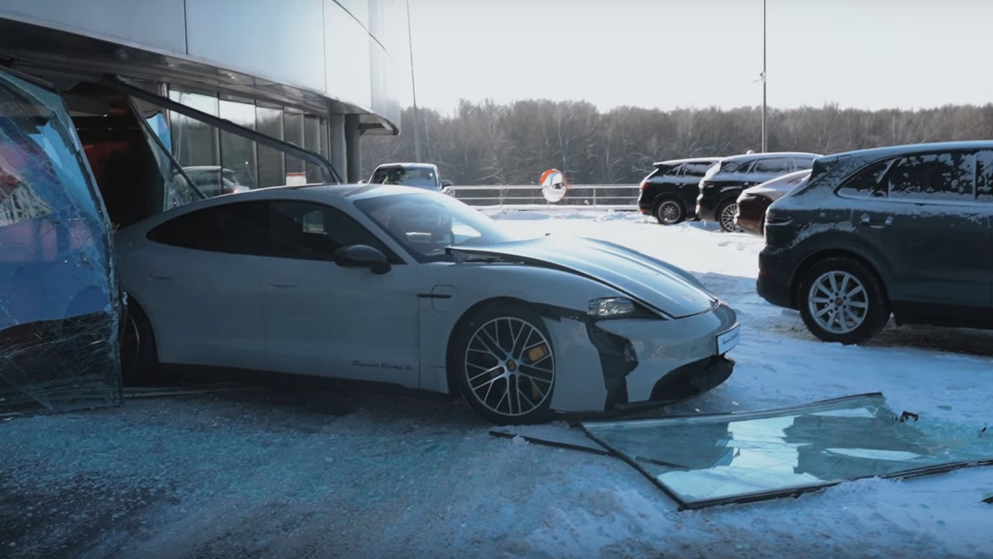 Russian Vlogger Shows Off Porsche Taycan&#8217;s Instant Torque by Smashing Through Dealership Window