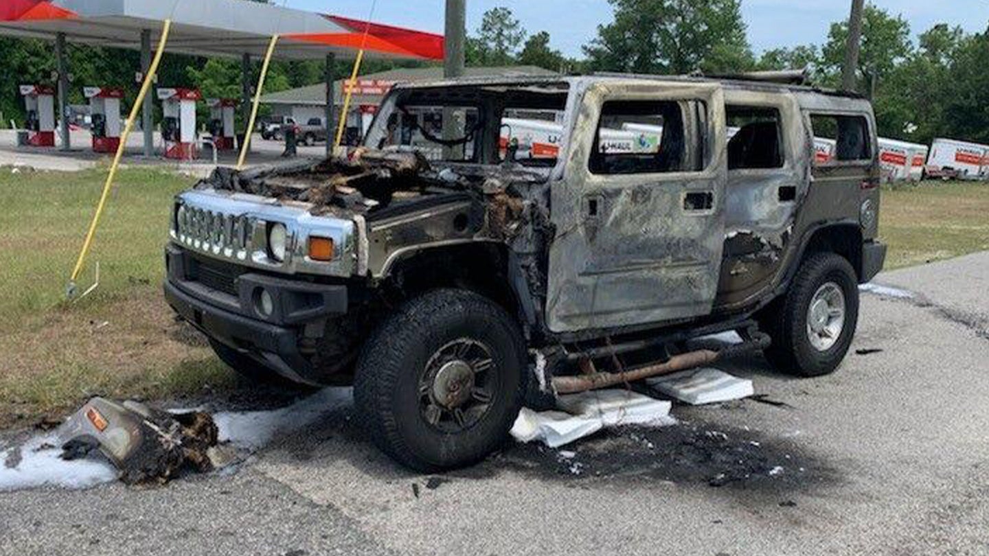 Hummer Erupts in Flames Just Feet From Gas Pump After Stockpiling Fuel in the Trunk