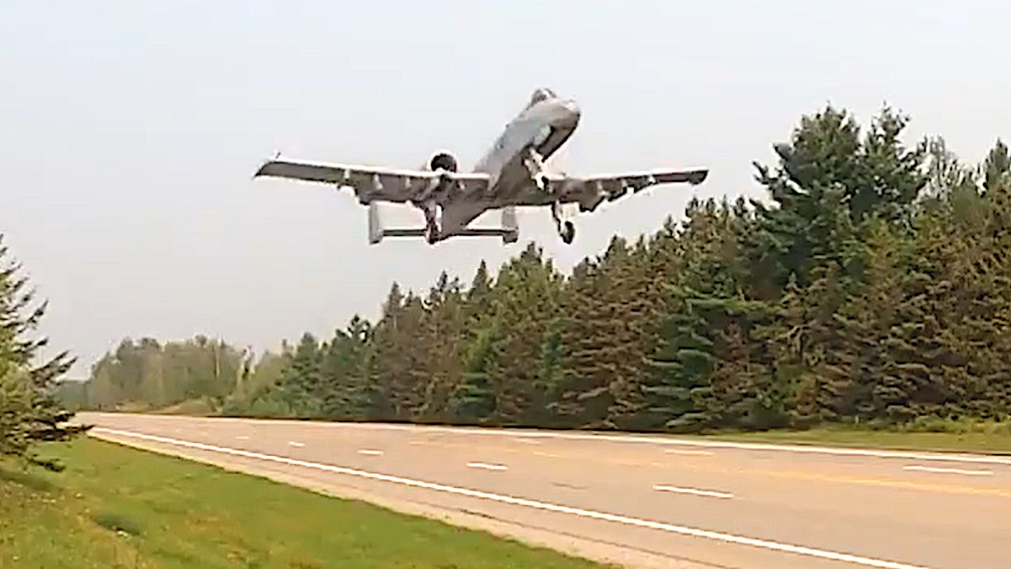 An A-10 Warthog ground attack aircraft takes off from a highway in Michigan during an exercise in August 2021.