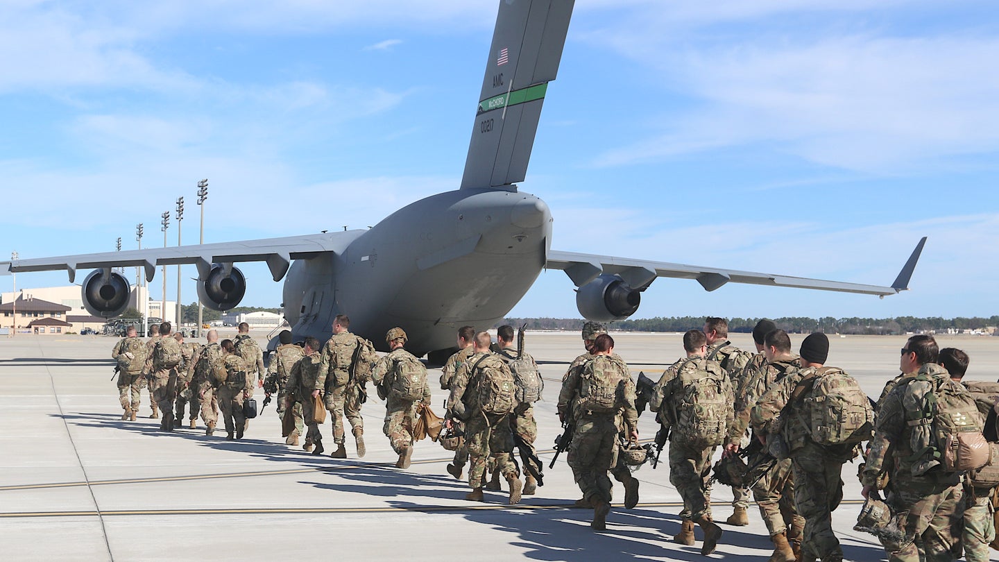 Members of the Immediate Response Force board a C-17 airlifter ahead of a deployment in 2020.