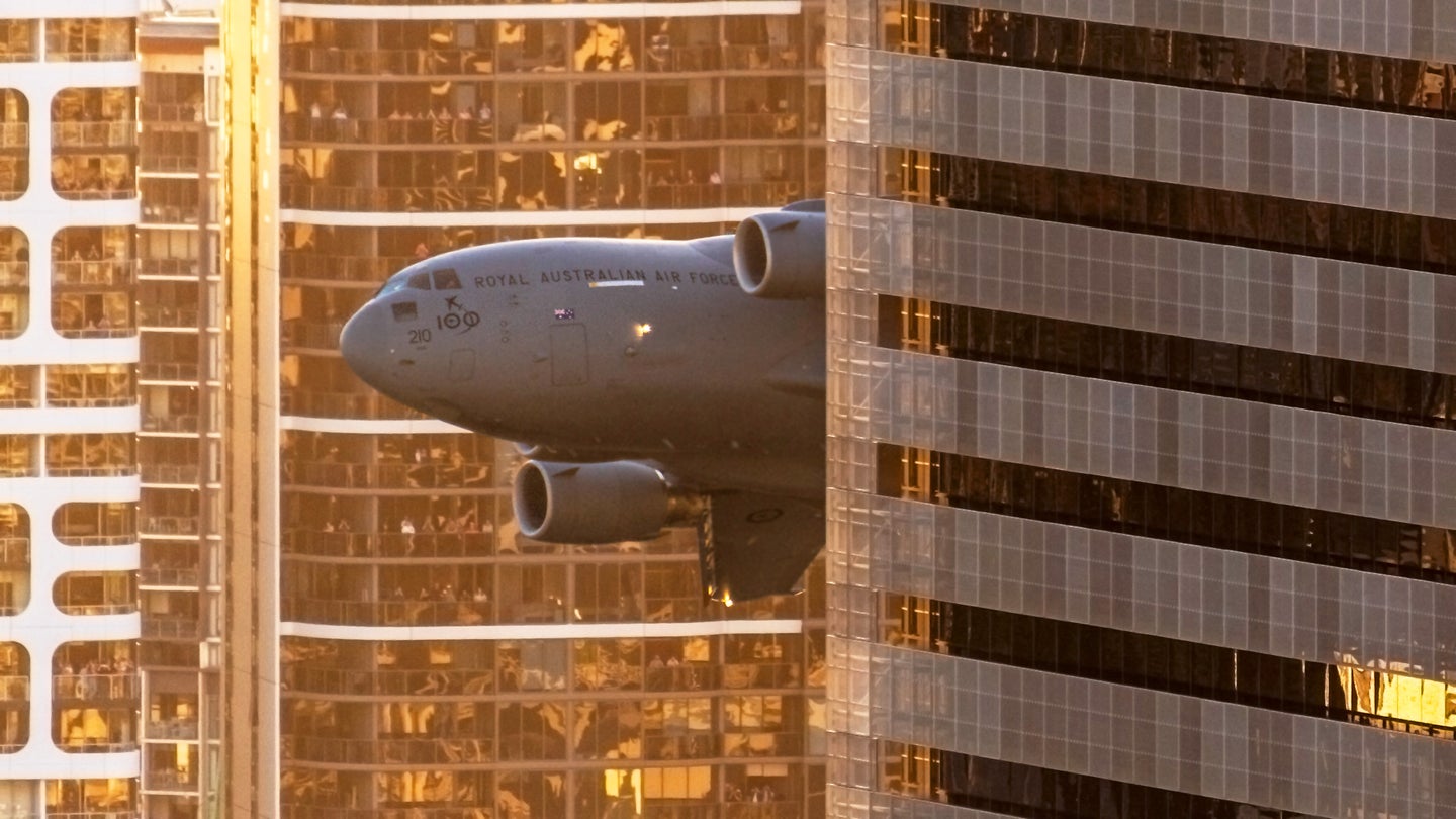 These Images Of Aussie C-17s Flying Among Skyscrapers In Brisbane Are The Best We’ve Ever Seen