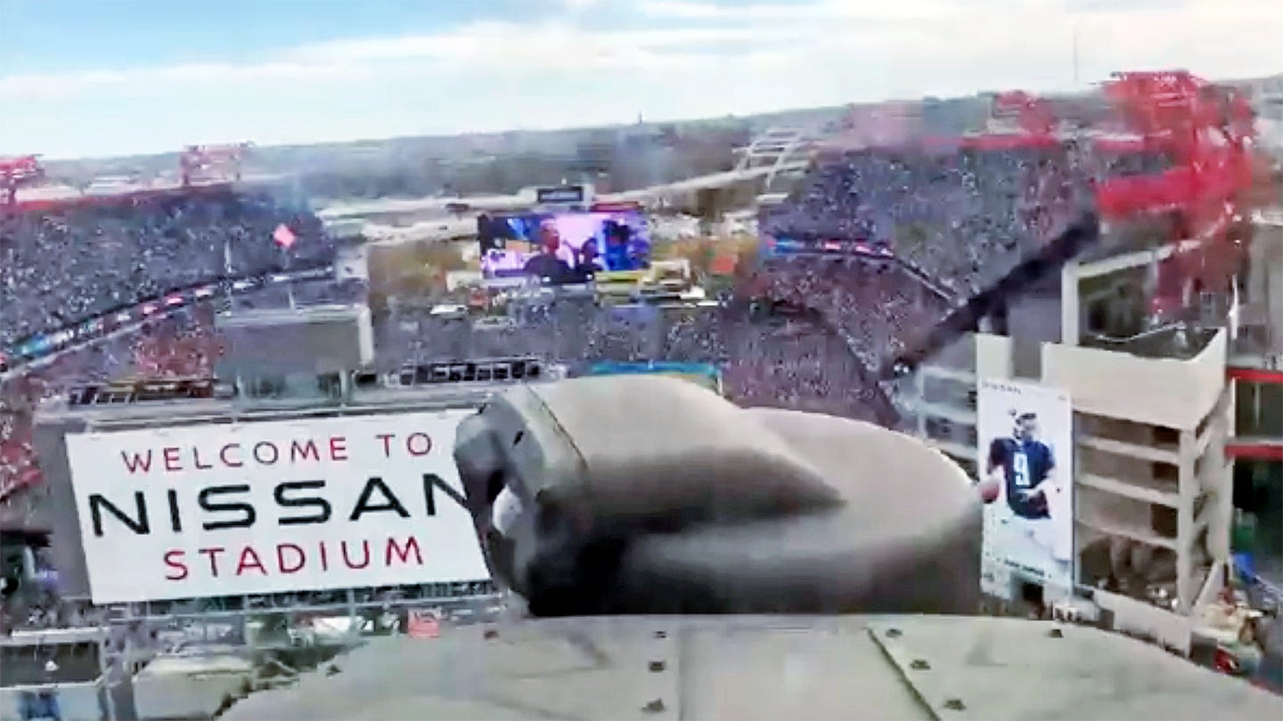 A screen grab from a video shot from the cockpit of an AH-64 Apache attack helicopter during a flyover of Nissan Stadium in Nashville, Tennessee on Nov. 14, 2021.