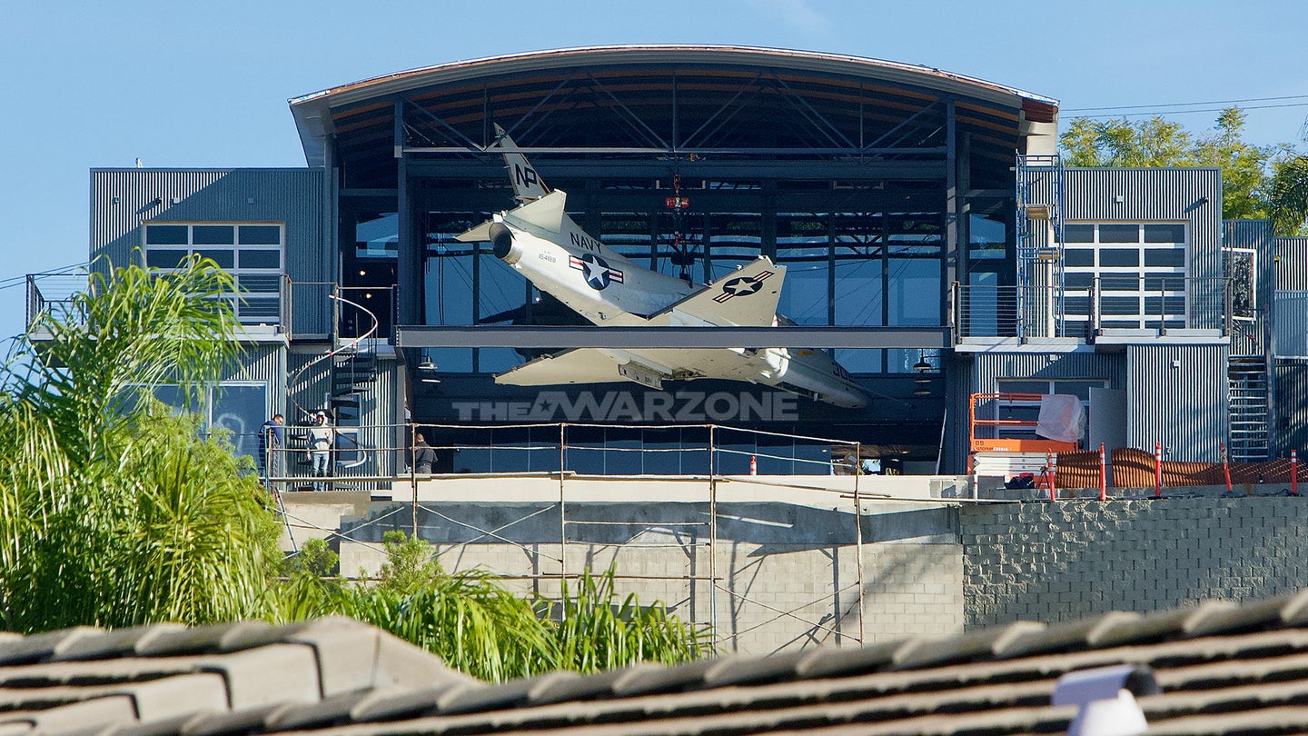 This Crazy Mansion Features An A-4 Skyhawk Dangling Over Its Patio