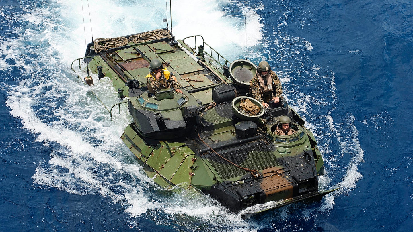 An amphibious assault vehicle, assigned to the 31st Marine Expeditionary Unit (MEU), prepares to embark the well deck of the amphibious dock landing ship USS Germantown (LSD 42) during the Amphibious Landing Exercise 2015 (PHIBLEX15). PHIBLEX15 is an annual bilateral training exercise conducted with the Armed Forces of the Philippines. Germantown is part of the Peleliu Expeditionary Strike Group, commanded by Rear Adm. Hugh Wetherald, and is conducting joint forces exercises in the U.S. 7th Fleet area of responsibility. (U.S. Navy Photo by Mass Communication Specialist 2nd Class Amanda R. Gray/Released)