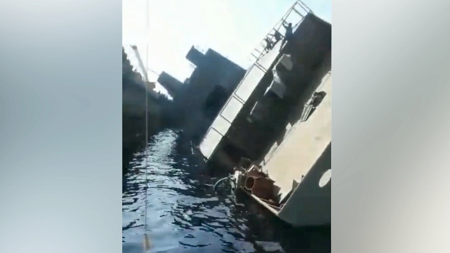 Iran’s Newest Warship Has Fallen On Its Side In A Dry Dock (Updated)