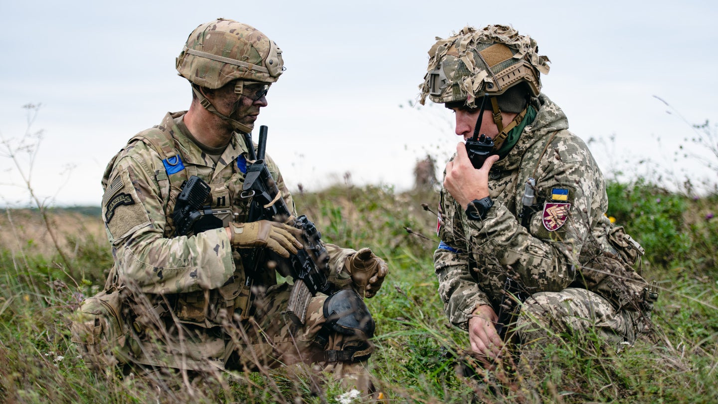 A US Army soldier and a member of Ukraine's armed forces during Exercise Rapid Trident 2021.