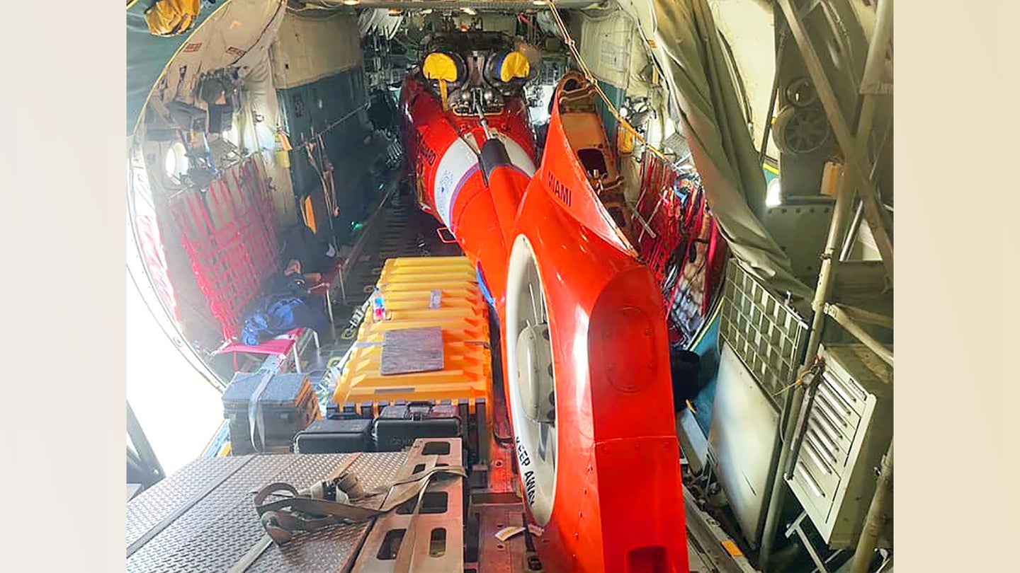 A Coast Guard MH-65 Dolphin Helicopter Can Fit Inside A C-130