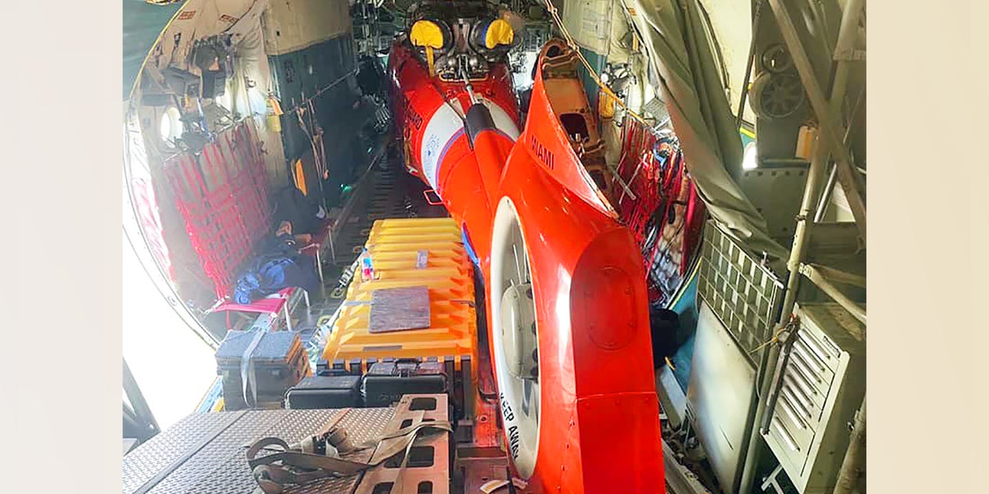 A Coast Guard MH-65 Dolphin Helicopter Can Fit Inside A C-130