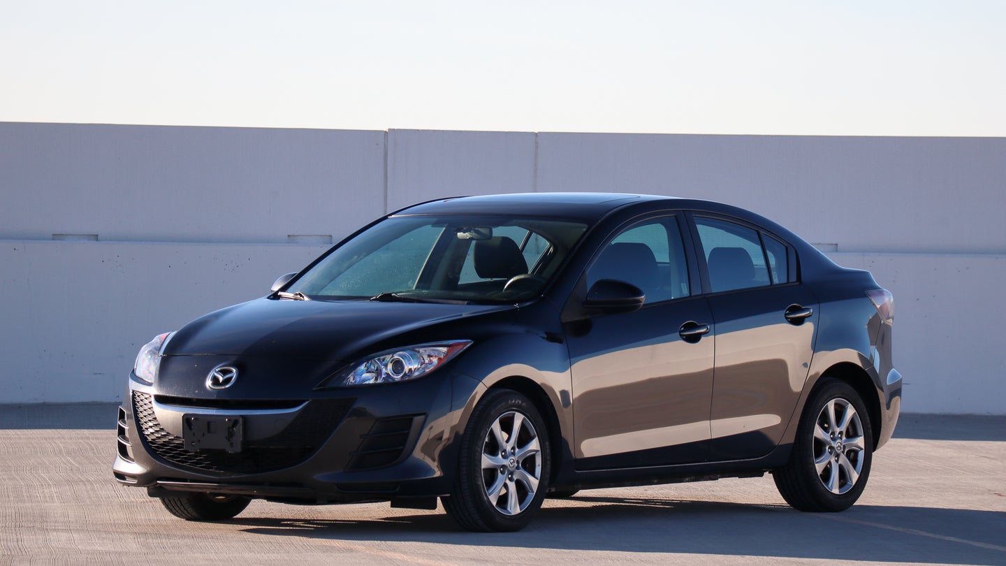 How I Made Almost $1,000 Fixing and Flipping a Mazda 3 With a Sticky Dash