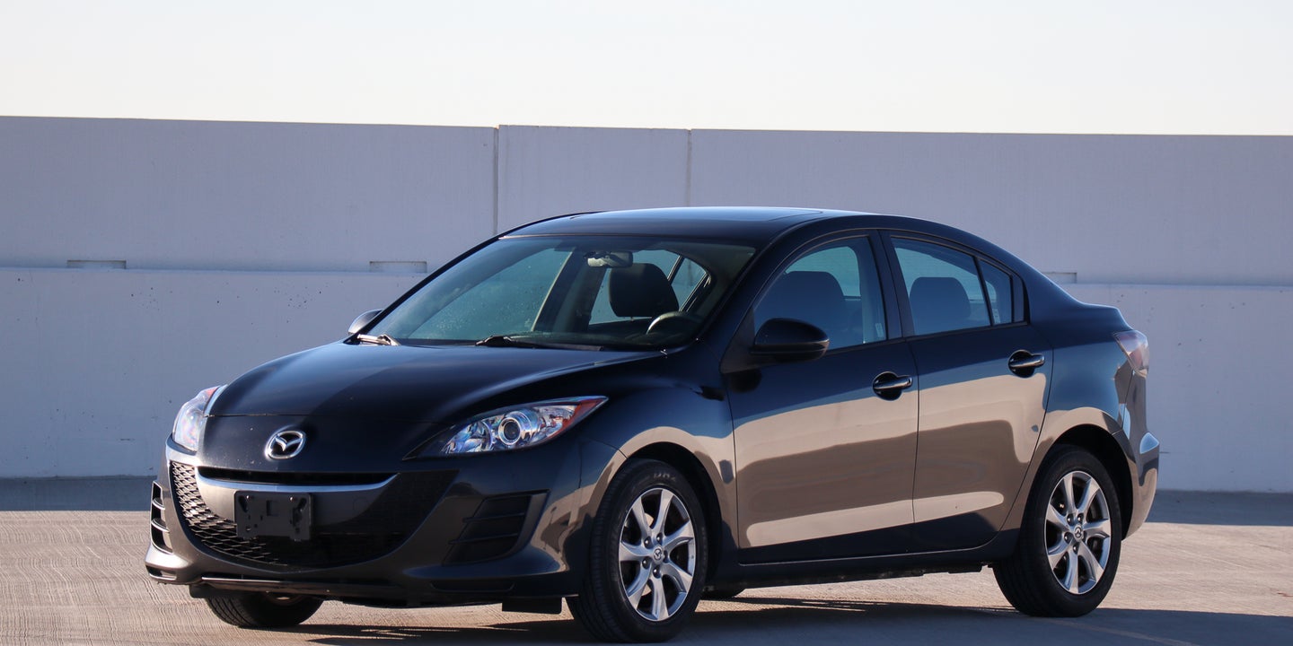 How I Made Almost $1,000 Fixing and Flipping a Mazda 3 With a Sticky Dash