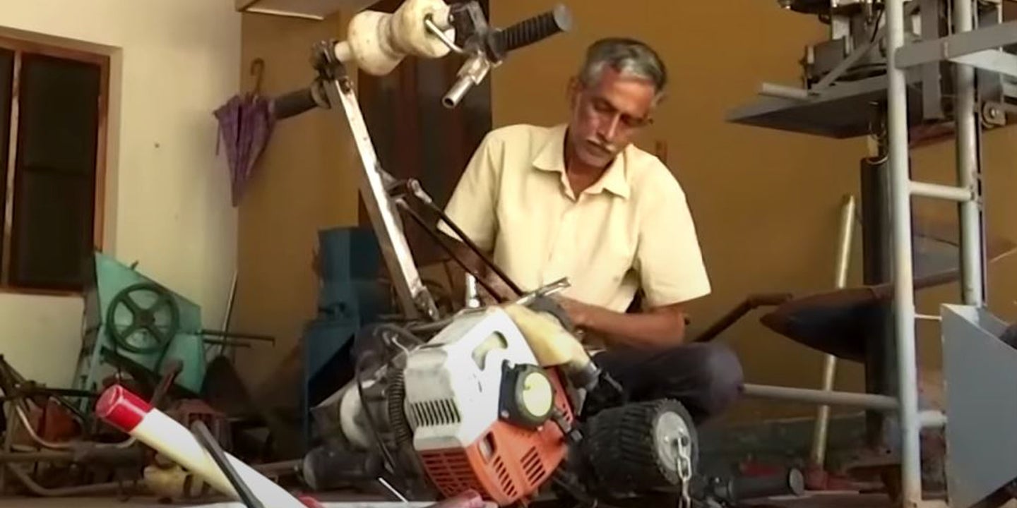 This Ingenious Nut Farmer Made a Vertical Scooter to Drive Up Tall Trees