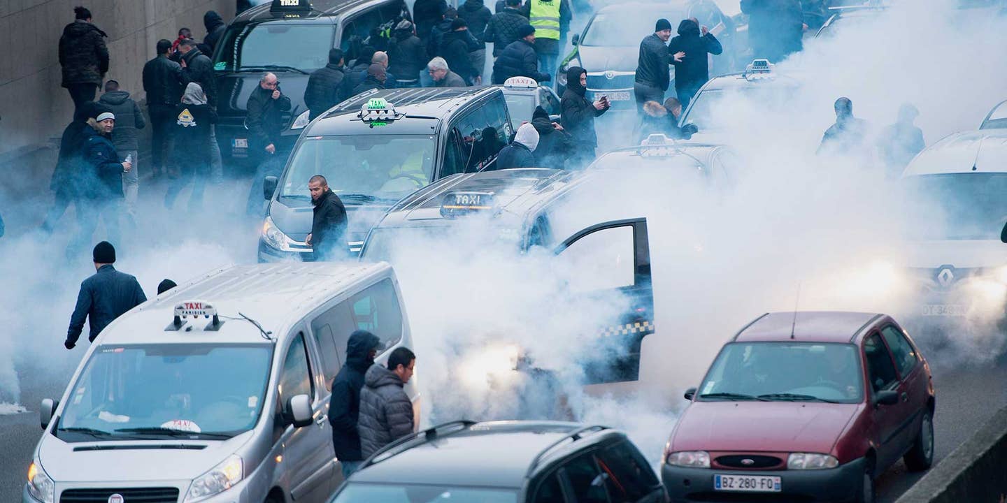 Paris Taxi Drivers Protest Uber by Blocking Roads