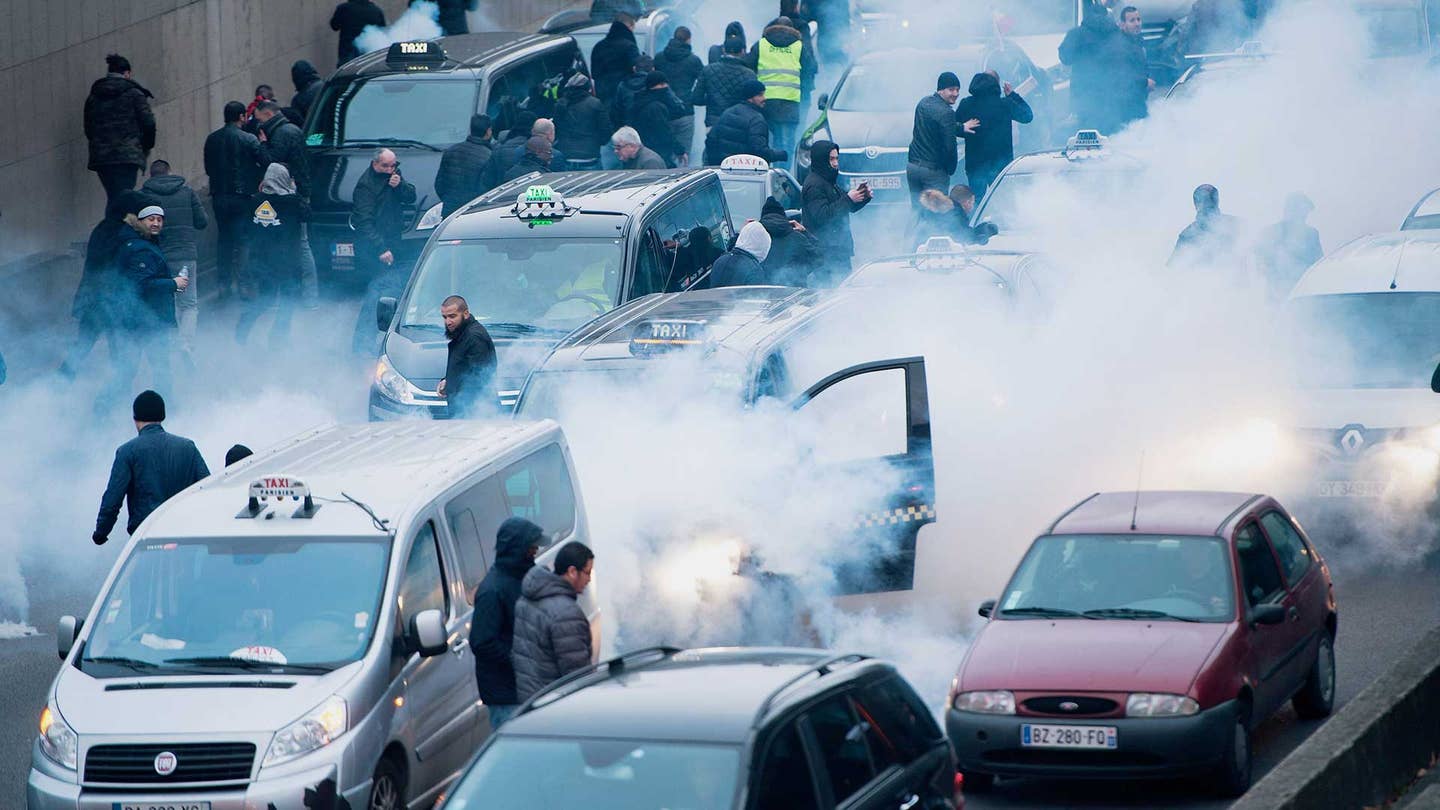 Paris Taxi Drivers Protest Uber by Blocking Roads