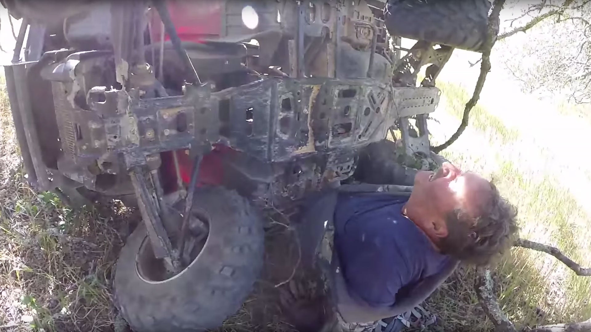 Dirt Biker Frees Pinned ATV Rider, MacGyver-style | The Drive