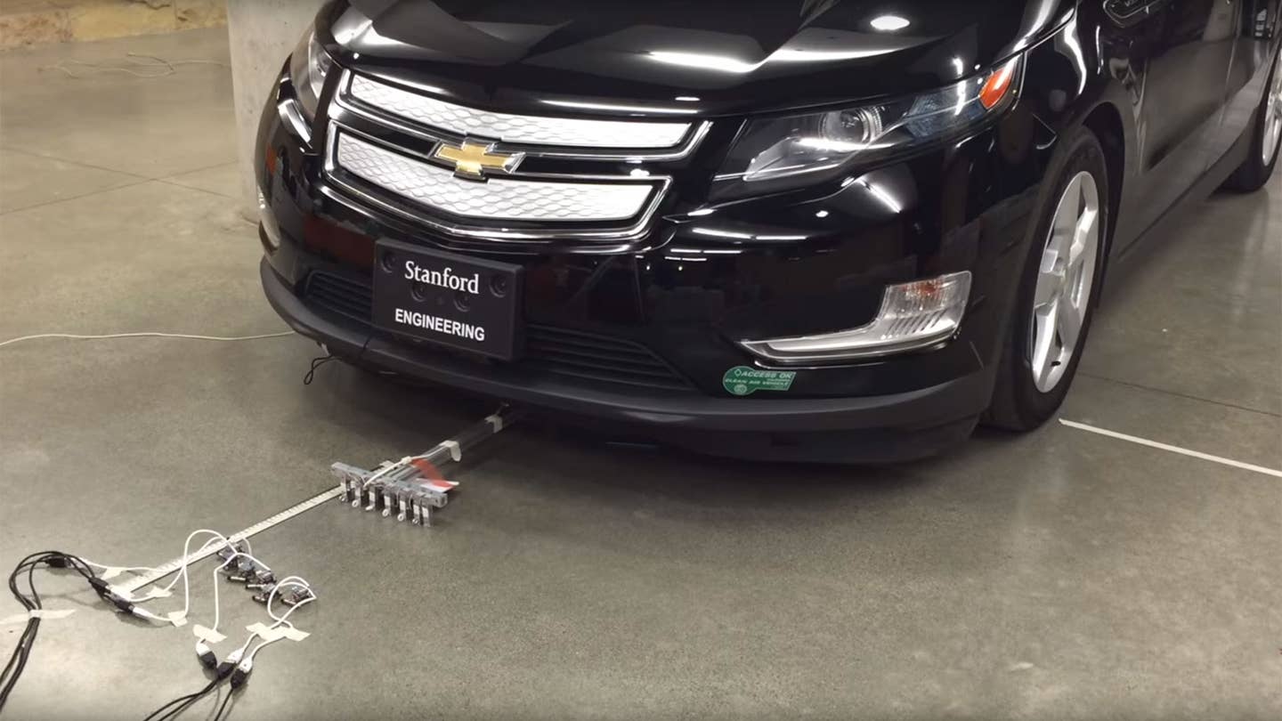 Watch These Six Tiny, Adorable Robots Pull a Chevy Volt