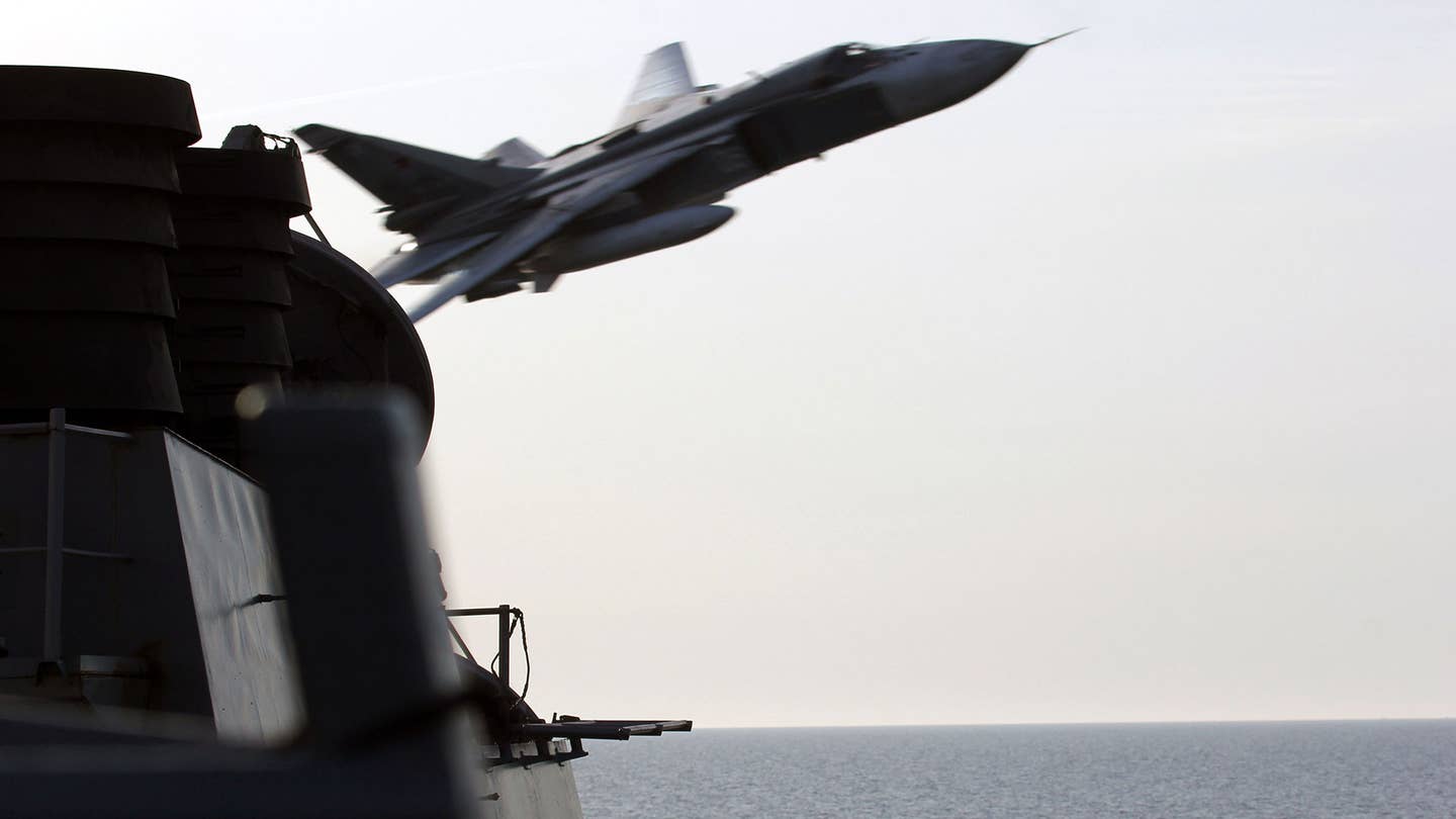 Watch Russian Fighter Jets Come Shockingly Close to a U.S. Navy Ship